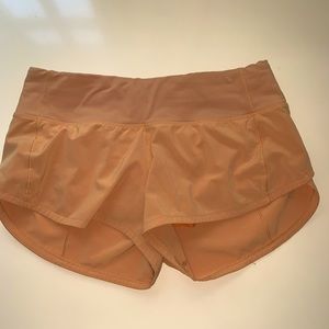 Lululemon orange speed up shorts size 2, 2.5” inseam